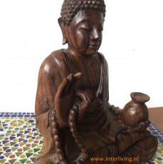 Handgemaakte houten boeddha beeldjes van hout