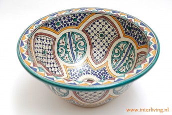 Kleurrijke opbouwwasbak in ronde vorm uit Fes Marokko. Waskom van aardewerk handgeschilderd en hand gemaakt.